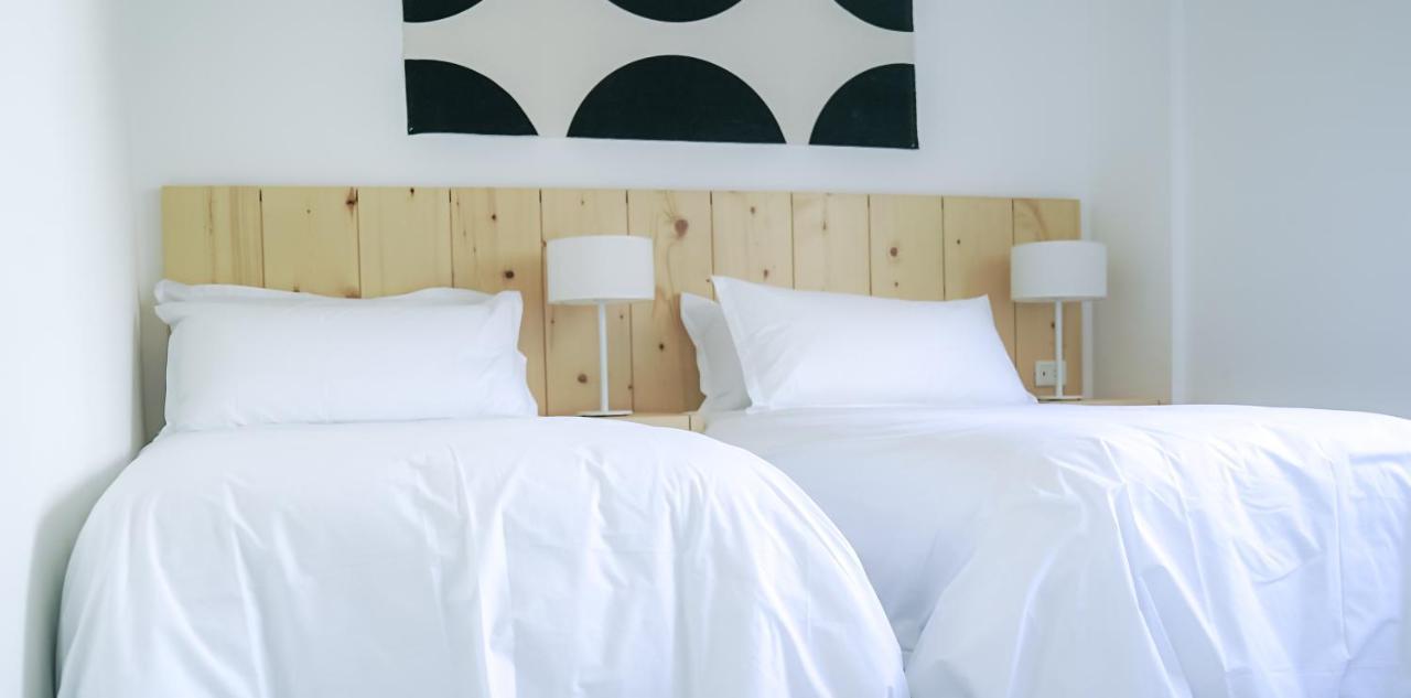 Casagrande Hotel & Beach Club Jose Ignacio  Εξωτερικό φωτογραφία A bed with white sheets
